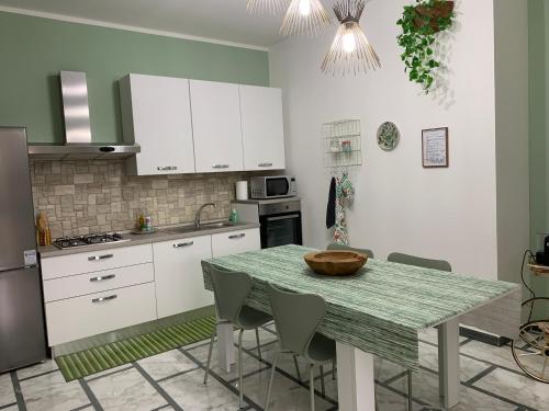 Kuchyňa alebo kuchynka v ubytovaní "L' Industrial Green" Apartment