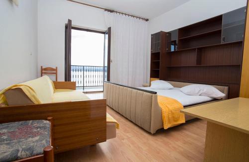 Postel nebo postele na pokoji v ubytování Stanici beach apartments