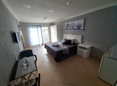 Χώρος καθιστικού στο Stay at Home Airport Lodge