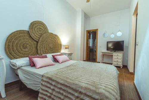 Postel nebo postele na pokoji v ubytování apartamento Chilches playa