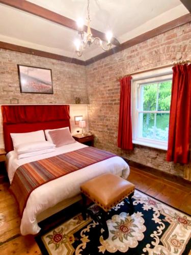 Postel nebo postele na pokoji v ubytování Clone Country House