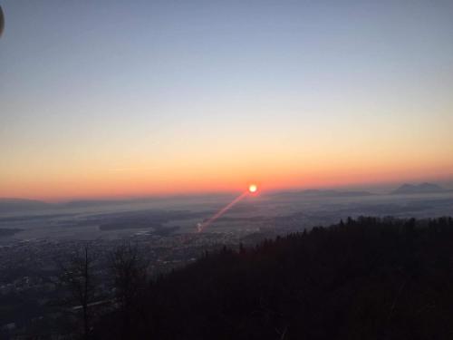 a sunset from the top of a mountain at Garden House in Kranj