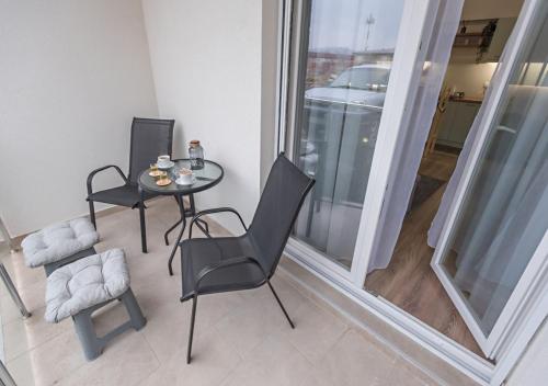 Un balcón o terraza de Apartman Jasen - Апартман Јасен