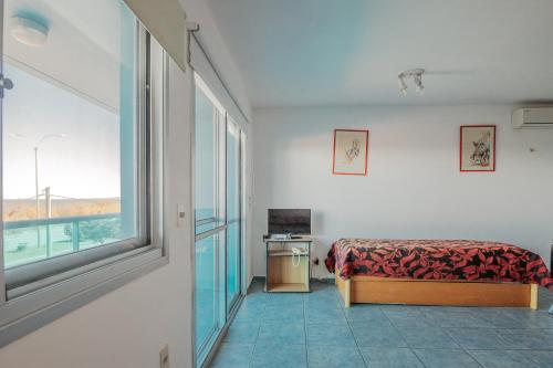 Μια τηλεόραση ή/και κέντρο ψυχαγωγίας στο Apart Hotel Punta Azul