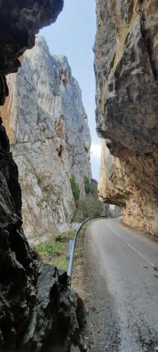 a view of a road through a rocky mountain at Golemi kamik Pirot Vlasi in Pirot