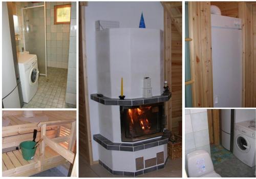 a kitchen with a fireplace and a stove in a room at Himos , Nuppulanranta cottage in Jämsä