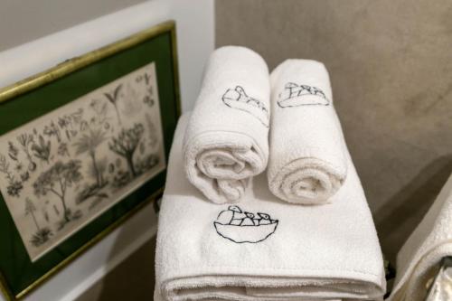 two towels on a towel rack in a bathroom at Leśniczówka u Zięby in Kościelisko