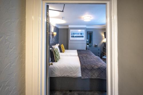Katil atau katil-katil dalam bilik di Gloucester House