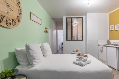 Katil atau katil-katil dalam bilik di WS Hôtel de Ville - Le Marais