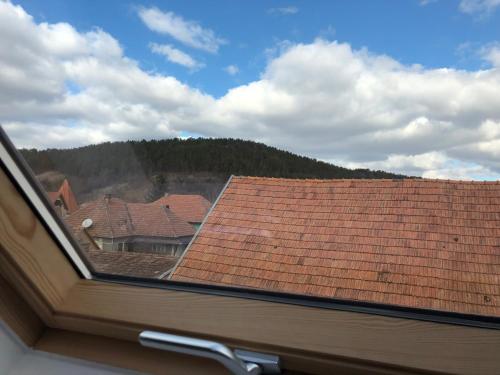 a view from the window of a roof at Tünde Vendégház in Viştea