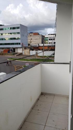 an empty room with a view of a city at Apto aconchegante no Guará II,próximo ao aeroporto in Brasilia