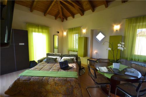 Postel nebo postele na pokoji v ubytování Casa Brina Suites