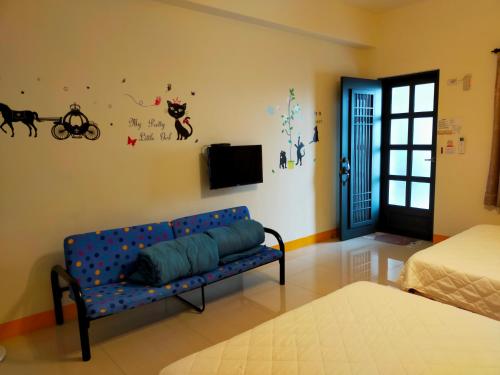 Postel nebo postele na pokoji v ubytování Jia Yuan Homestay