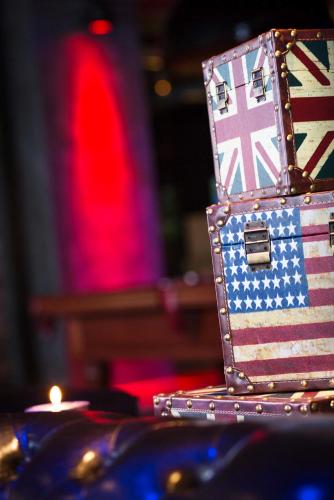 a suitcase with the british flag on it at pentahotel Reading in Reading