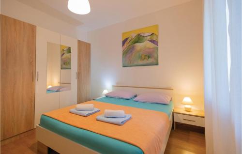 Krevet ili kreveti u jedinici u objektu Nice Home In Vrgorac With 1 Bedrooms, Wifi And Heated Swimming Pool
