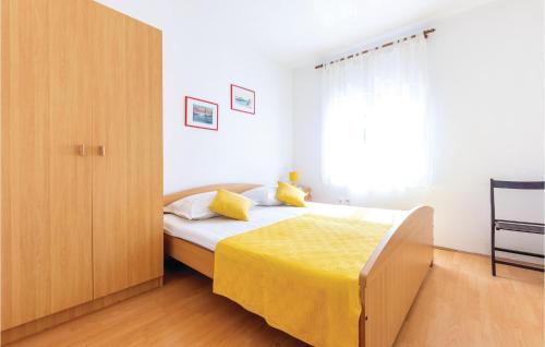Posteľ alebo postele v izbe v ubytovaní Apartment Okrug Donji Osoje