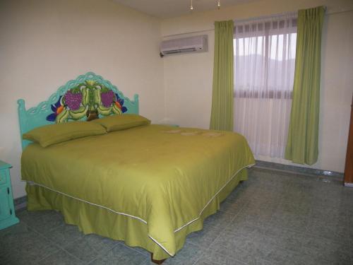 Łóżko lub łóżka w pokoju w obiekcie Hotel Paradise Lagoon