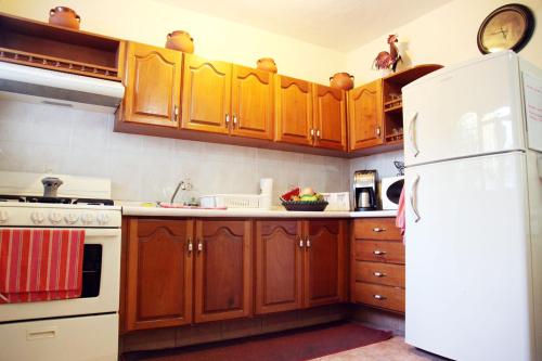 Η κουζίνα ή μικρή κουζίνα στο Hostal Casa Blanca