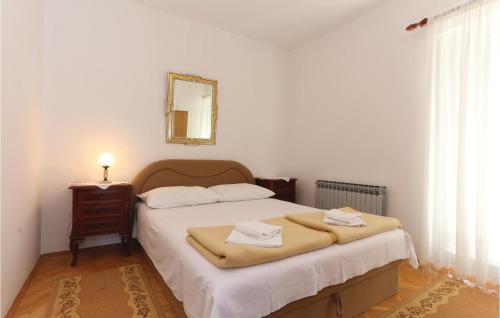 Ένα ή περισσότερα κρεβάτια σε δωμάτιο στο 2 Bedroom Stunning Apartment In Stanici