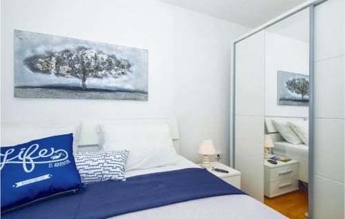 Krevet ili kreveti u jedinici u okviru objekta Nice Apartment In Postira With Wifi