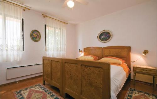Katil atau katil-katil dalam bilik di Awesome Apartment In Kanica With Kitchen