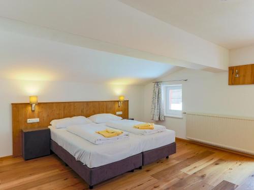 Ein Bett oder Betten in einem Zimmer der Unterkunft Peaceful Holiday Home in Krimml Salzburg with Sauna