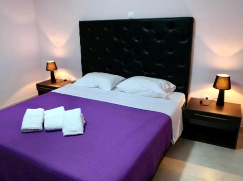 Posteľ alebo postele v izbe v ubytovaní Spilios Apartment