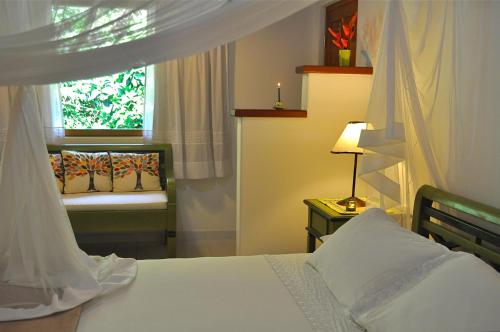 Cama o camas de una habitación en Pousada Quarto Crescente
