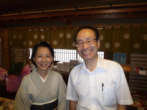 
a man and a woman pose for a picture at Izumi-so in Gero

