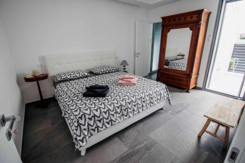 เตียงในห้องที่ La casetta di Gio'
