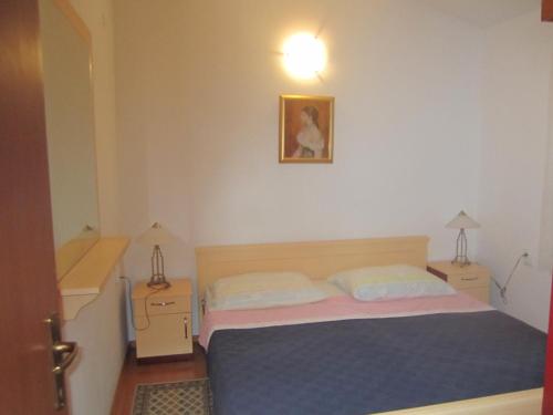 Postel nebo postele na pokoji v ubytování Villa Ojdana
