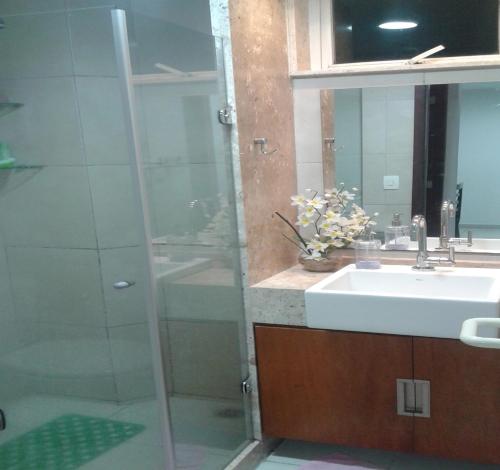 Ванна кімната в Flat no Villa Hípica - Gravatá