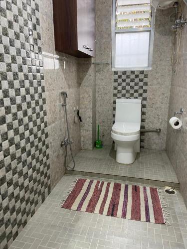 Um banheiro em Newa House
