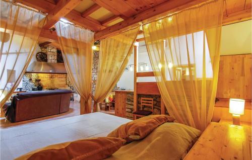 a bedroom with a bed in a room at 1 Bedroom Pet Friendly Studio In Vodnjan in Vodnjan