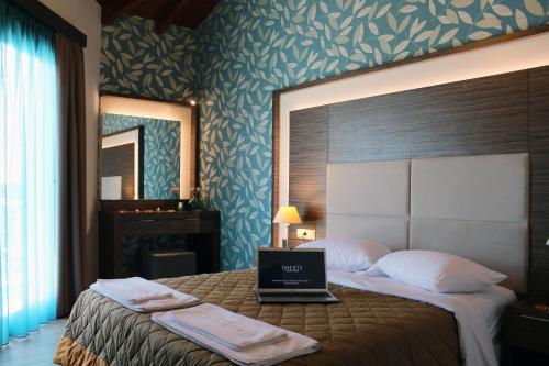 Postel nebo postele na pokoji v ubytování Imerti Resort Hotel