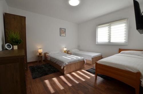 Un pat sau paturi într-o cameră la Carducci 16