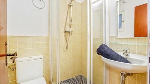 a bathroom with a toilet and a sink at Apartment Bone 2 - Llafranc in Llafranc