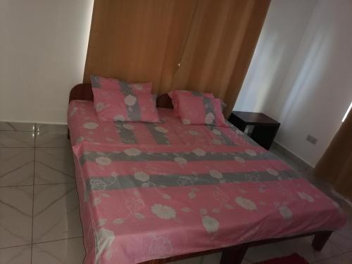 Postel nebo postele na pokoji v ubytování Creole Cottage Apartment