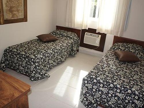 Cama o camas de una habitación en Flat no Villa Hípica - Gravatá