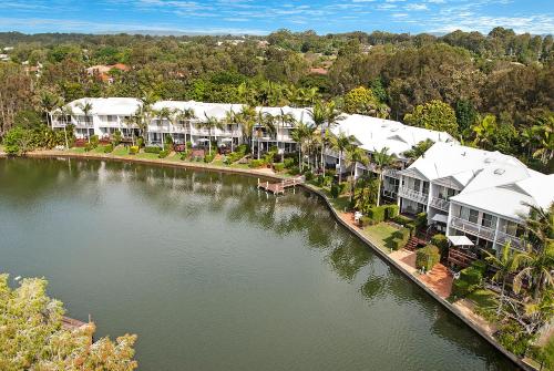 an aerial view of a resort with a body of water at Portside Noosa Waters in Noosaville