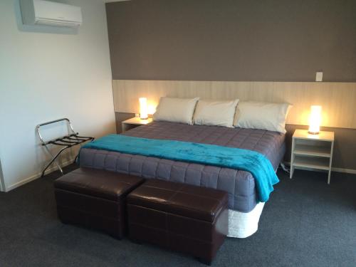 Postel nebo postele na pokoji v ubytování Rolleston Highway Motel