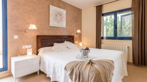 מיטה או מיטות בחדר ב-Villa Etruria close to Playa d'en Bossa
