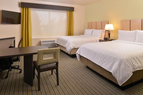 Кровать или кровати в номере Candlewood Suites - Austin Airport by IHG