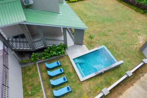 an overhead view of a house with a swimming pool at Hidden Valley Residence in Au Cap