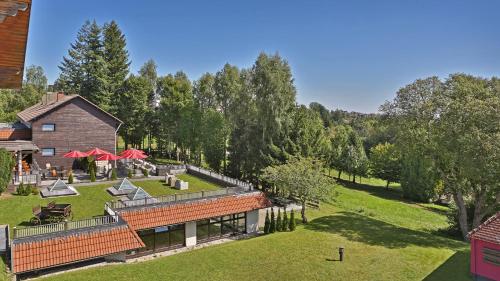 an aerial view of a house with a yard at Waldhotel Luise in Freudenstadt