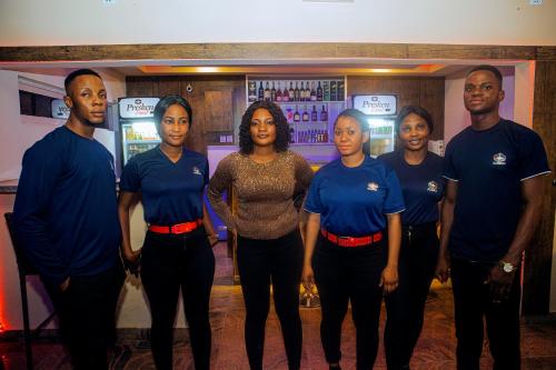 a group of people standing in a room at PRESKEN HOTELS @FAJODD-4 in Ikeja