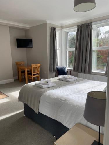 Ένα ή περισσότερα κρεβάτια σε δωμάτιο στο Braemar