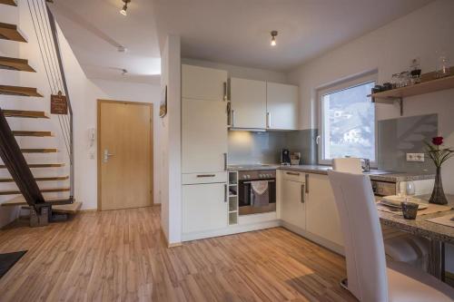 Kuchyň nebo kuchyňský kout v ubytování Appartement Raffael