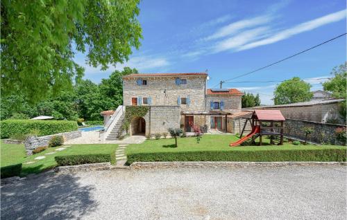 Vonkajšia záhrada v ubytovaní Holiday Home Pamici V