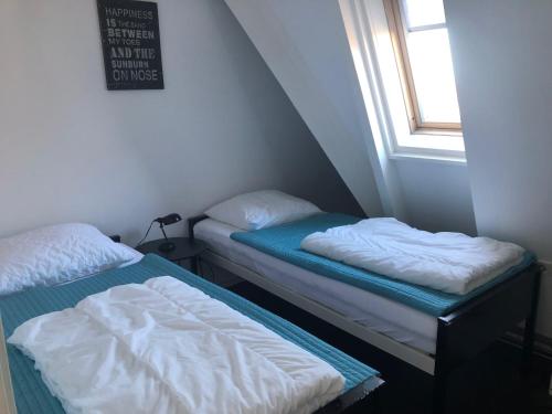 Ένα ή περισσότερα κρεβάτια σε δωμάτιο στο Appartement Modern Egmond